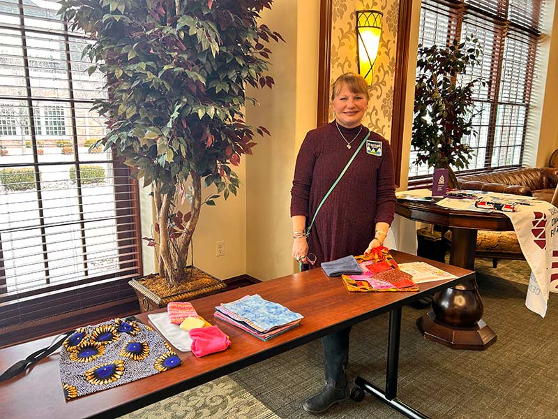 Peggy Jessmore at her table during Saturday's event at Melaleuca. | Rett Nelson, EastIdahoNews.com