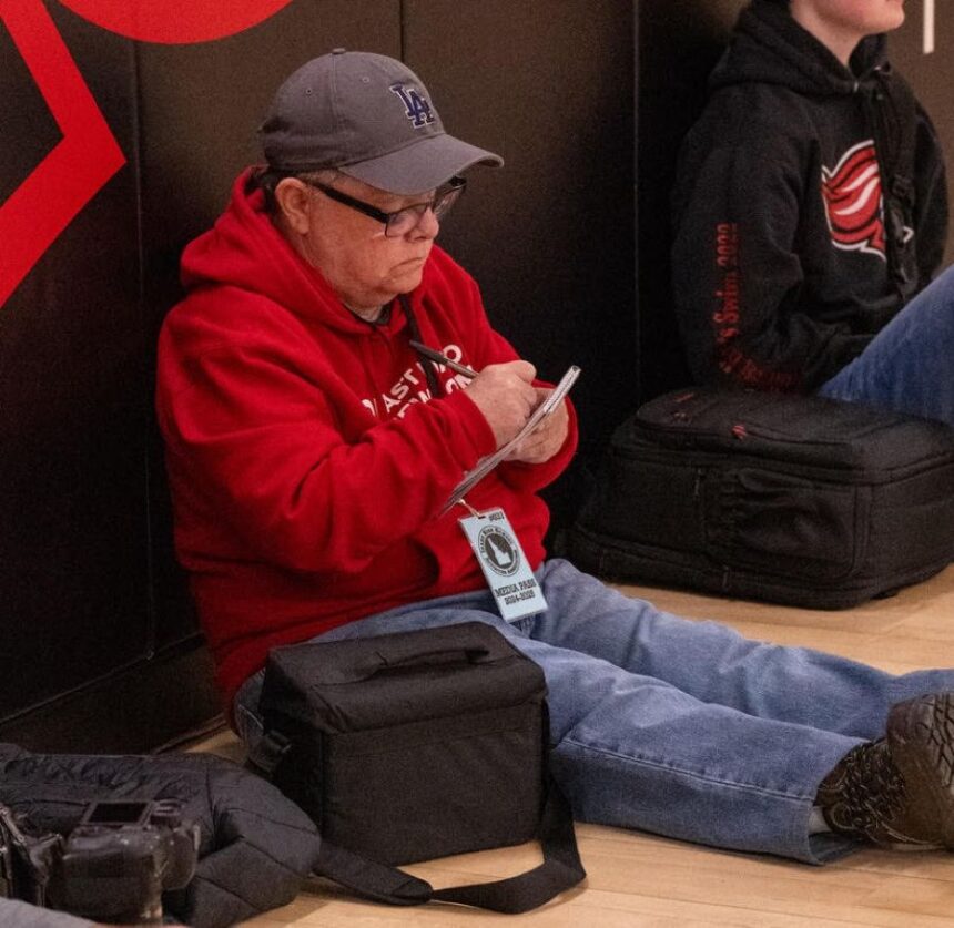 Our intrepid sports writer at work. | Courtesy photo.