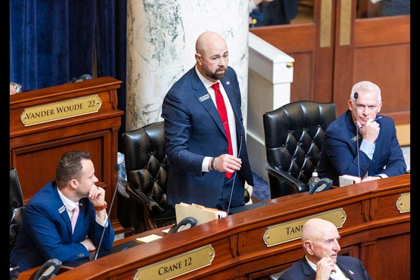 Assistant Majority Leader Josh Tanner, R-Eagle, (center) speaks from the House floor on March 10, 2025, at the Idaho Capitol Building in Boise. (Pat Sutphin for the Idaho Capital Sun)