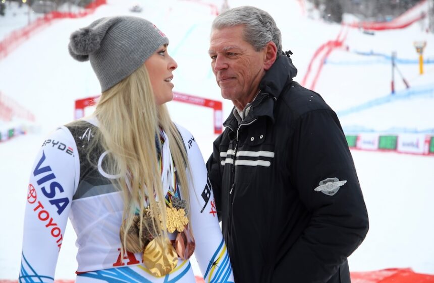 United States' Lindsey Vonn poses with her career medals with her father Alan Kildow, in the finish area after the women's downhill race, at the alpine ski World Championships in Are, Sweden, Sunday, Feb. 10, 2019.