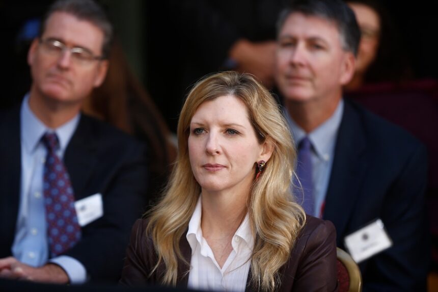 White House counsel Kathryn Ruemmler listens as President Barack Obama speaks at an installation ceremony for FBI Director James Comey at FBI Headquarters, in Washington, Oct. 28, 2013.