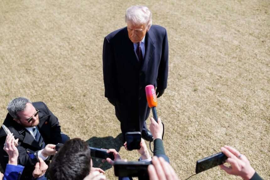 President Donald Trump speaks to reporters before departing on Marine One from the South Lawn of the White House, Friday, Feb. 27, 2026, in Washington.