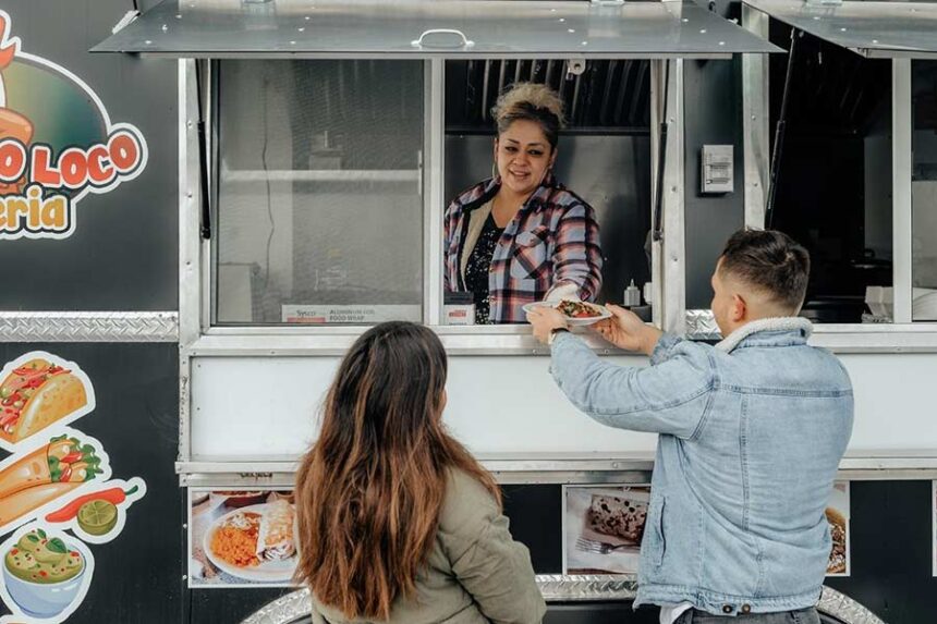 Ana Lilia Perez at Taqueria El Pollo Loco Jr. serving food to patrons. The food truck is opening a permanent storefront at 248 South Second Street in Rexburg. | Courtesy Jose Perez