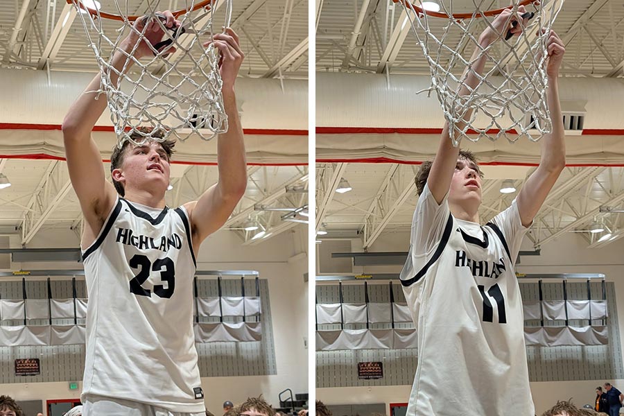 Highland's Tanner Hunt (left) and Stockton Moore cut down the net