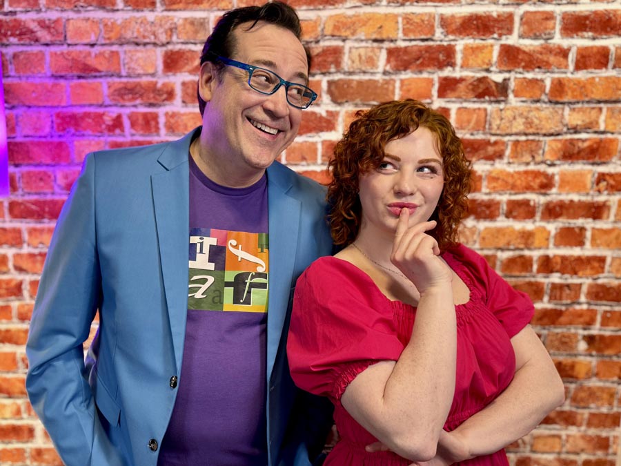 IFAF hosts Mike Nelson and Karley Morgan pose for a photo. | Courtesy IFAF