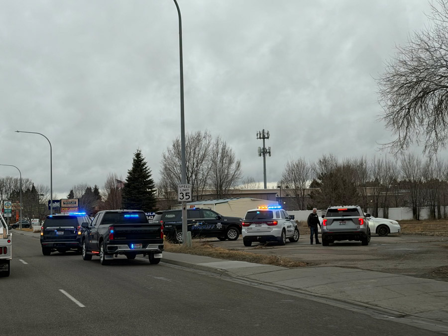 Officers and deputies at the scene after a wanted felon ran from a traffic stop. | Courtesy of Stephan Rockefeller