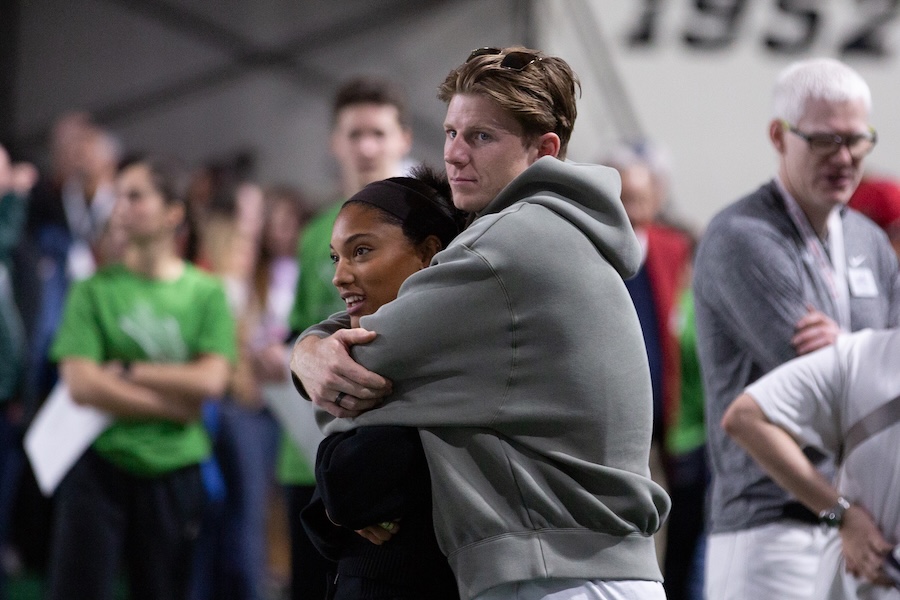 Hunter Woodhall holds his wife, Tara Davis-Woodhall, during the 2026 Simplot Games in Pocatello on Saturday, Feb. 21, 2026.