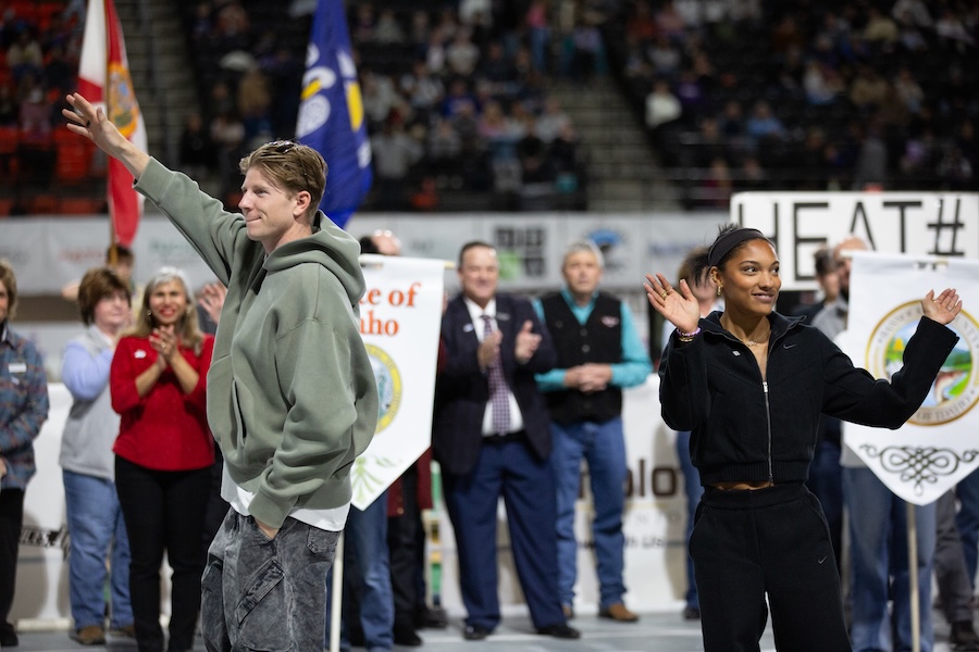 Hunter Woodhall and Tara Davis-Woodhall walk in the parade of athletes in the 2026 Simplot Games on Saturday, Feb. 21, 2026.