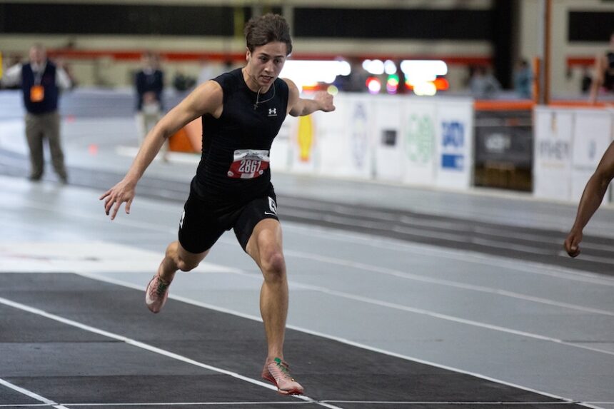 Jackson Laird runs the 60-meter dash final at the Simplot Games on Saturday, a day after he raced without shoes on.