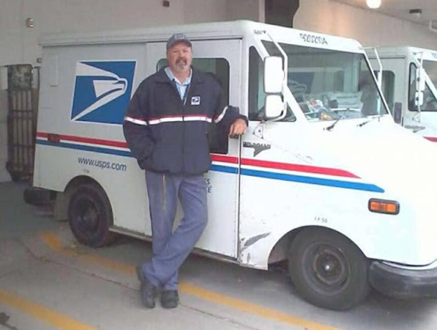 Neal Ard, ready to commandeer his mailtruck near the 20 year mark of his career. Photo courtesy Daniel Ard.