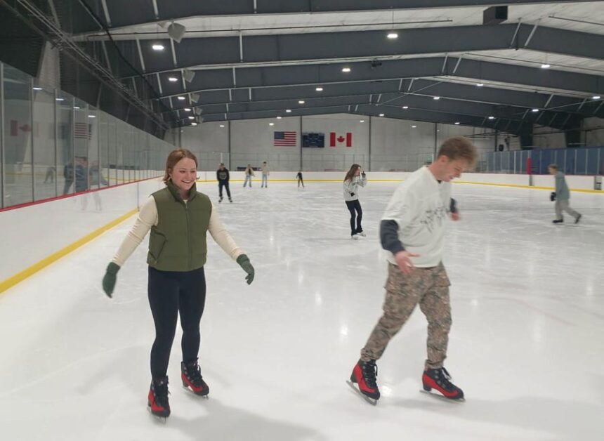 Spencer Warren and Isabella Bodily skate at Rexburg’s city ice rink on Monday. | David George, EastIdahoNews.com