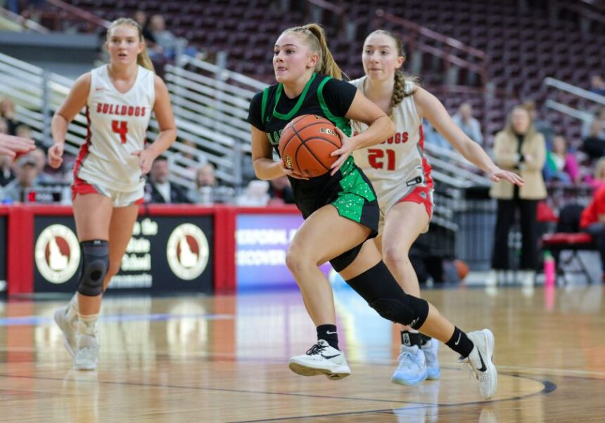 Blackfoot’s Blakee Ball (2) drives to the basket past the Sandpoint defense in their semi-final game on Friday. Photo by Steve Conner
