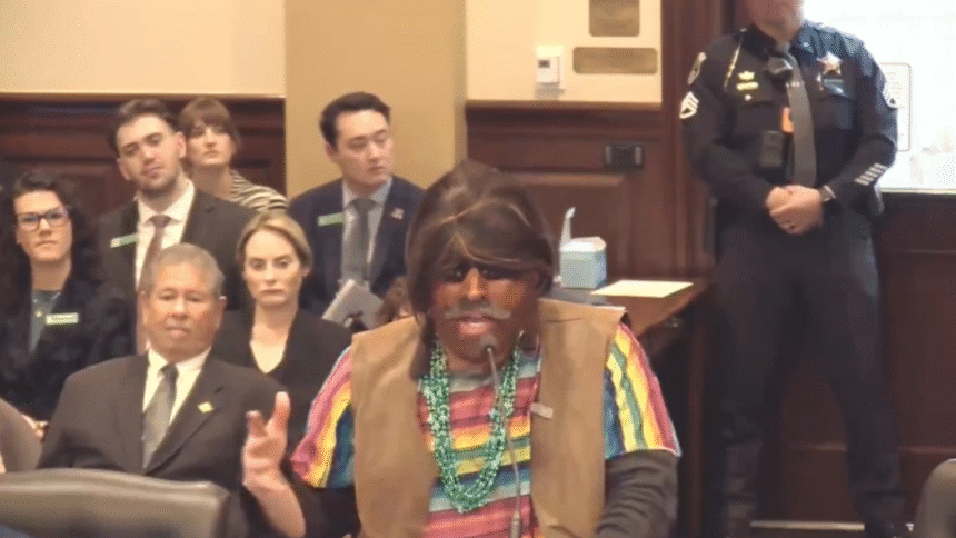 David Pettinger attempts to testify before Idaho's House Business Committee on Monday, Feb. 23, 2026, while wearing brownface and a sombrero and speaking Spanish.