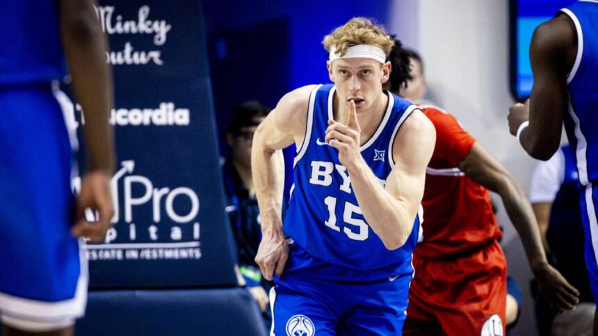 Richie Saunders' BYU basketball career ends due to an ACL tear in overtime during Saturday's game against Colorado. | KSL.com.