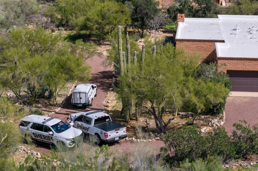 Pima County sheriff's officers gather on Nancy Guthrie's property on February 17 in Tucson, Arizona.
