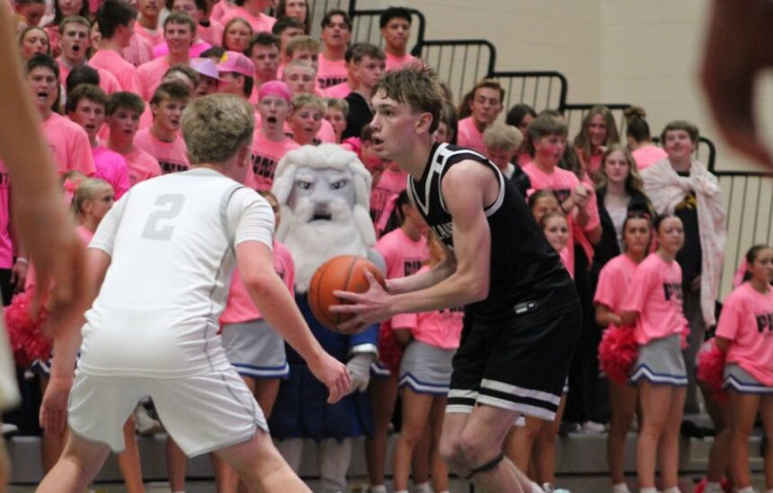 Highland's Marshall Glenn looks to pass as Thunder Ridge's Corbin Leishman defends. | Allan Steele, EastIdahoSports.com.