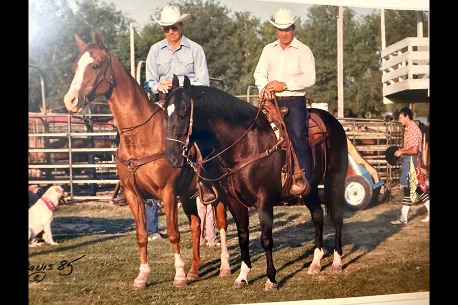 Dennis Lake, left, on horseback with one of his sons. | Courtesy Dexton Lake
