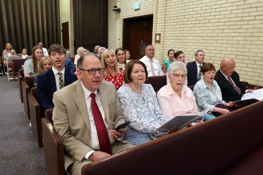 Members of The Church of Jesus Christ of Latter-day Saints sing selections from "Hymns -- For Home and Church" during their sacrament meeting in Murray, Utah, on June 1, 2025. On Thursday, 12 more hymns were added to the book.