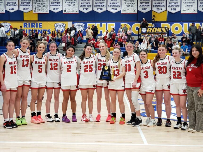 The Mackay girls basketball team celebrates a district title and berth to the 1A state tournament. | Allan Steele, EastIdahoSports.com.