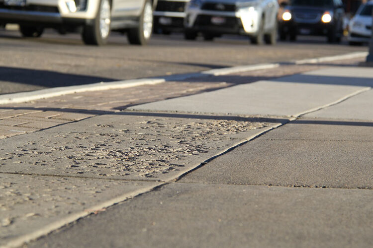 new sidewalk next to old sidewalk