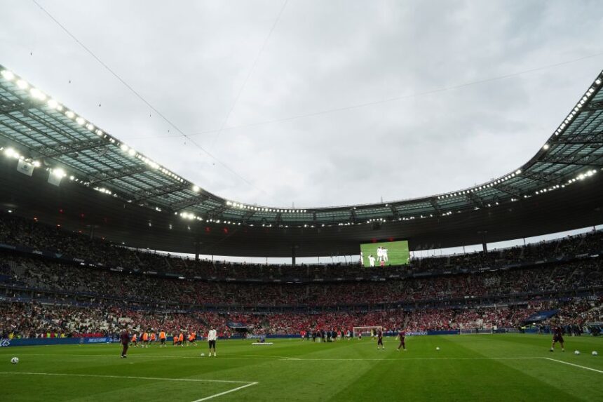 FILE - Players of Paris Saint-Germain and Reims warm up prior to the French Cup soccer final at the Stade de France stadium in Saint-Denis, outside Paris, Saturday May 24, 2025. (AP Photo/Aurelien Morissard, file)