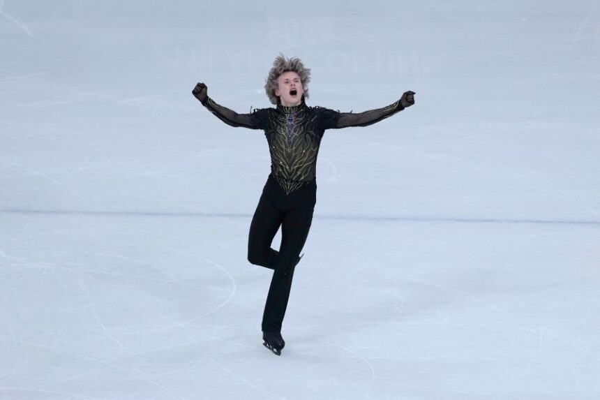 Ilia Malinin of the United States competes during the figure skating men's team event at the 2026 Winter Olympics, in Milan, Italy, Sunday, Feb. 8, 2026. (AP Photo/Natacha Pisarenko)