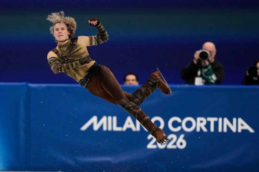 Ilia Malinin of the United States competes during the men's figure skating short program at the 2026 Winter Olympics, in Milan, Italy, Tuesday, Feb. 10, 2026. (AP Photo/Ashley Landis)