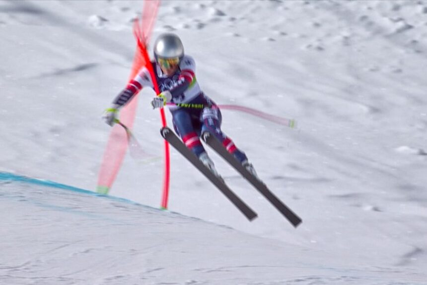 In this image taken from video provided by Olympic Broadcasting Services, OBS, United States' Lindsey Vonn crashes during an alpine ski women's downhill race, at the 2026 Winter Olympics, in Cortina d'Ampezzo, Italy, Sunday, Feb. 8, 2026. (Olympic Broadcasting Services via AP)