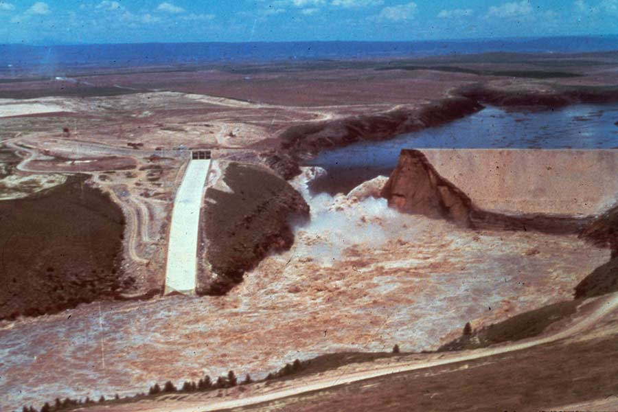 A wall of water breaking through the Teton Dam on July 5, 1976. | Brigham Young University-Idaho