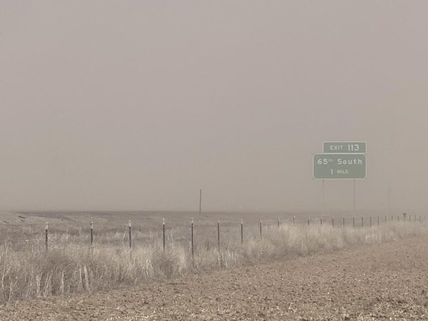 High winds whip up dust near Exit 113 on I-15 on Saturday, March 14, 2026, creating very low visibility and forcing the closure of the freeway.