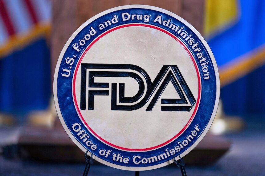 The Food and Drug Administration seal is seen at the Hubert Humphrey Building Auditorium in Washington, April 22, 2025.