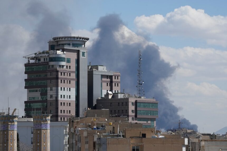 Smoke rises up after a strike in Tehran, Iran, Sunday, March 1, 2026. | Vahid Salemi, Associated Press