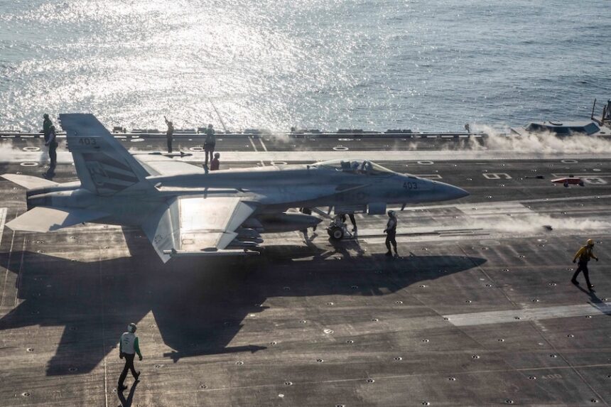 This image provided by U.S. Central Command shows an F/A-18E Super Hornet preparing to launch from the USS Abraham Lincoln (CVN 72) in support of Operation Epic Fury, on Saturday, Feb. 28, 2026.
