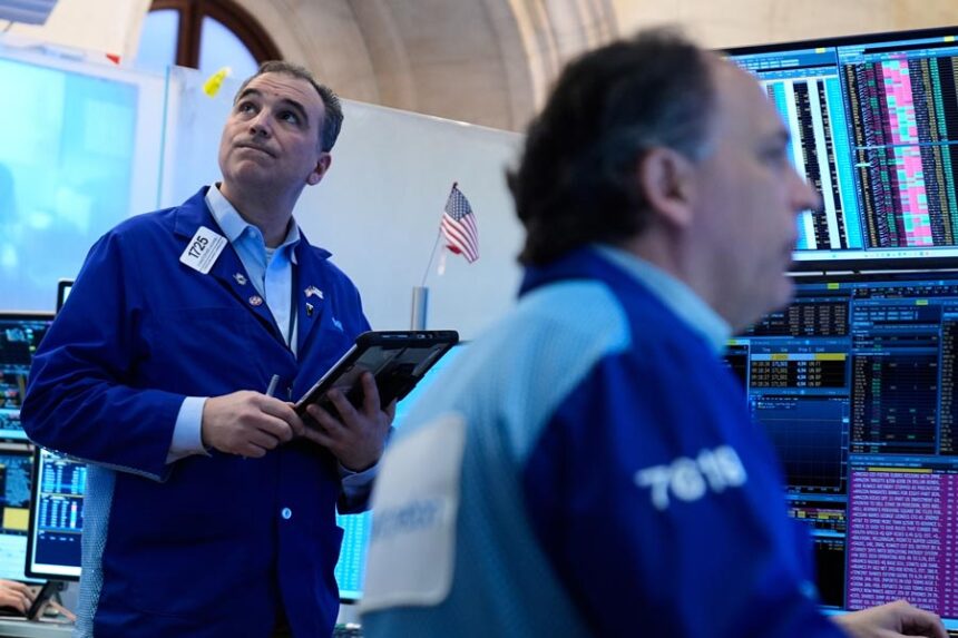 Christopher Lagana works on the floor at the New York Stock Exchange in New York, Tuesday, March 10, 2026. | Seth Wenig, Associated Press