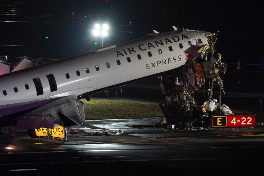 An Air Canada Jet sits on the runway at LaGuardia Airport, Monday, March 23, 2026, after colliding with a Port Authority aircraft rescue and firefighting vehicle after landing in New York. | Ryan Murphy, Associated Press