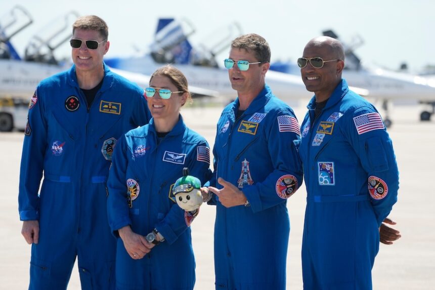 Artemis 2 crew members, from left, Mission Spc. Jeremy Hansen, of Canada, Mission Spc. Christina Koch, Commander Reid Wiseman, and Pilot Victor Glover pose for a photo after the crew's arrival at the Kennedy Space Center Friday, March 27, 2026, in Cape Canaveral, Fla.