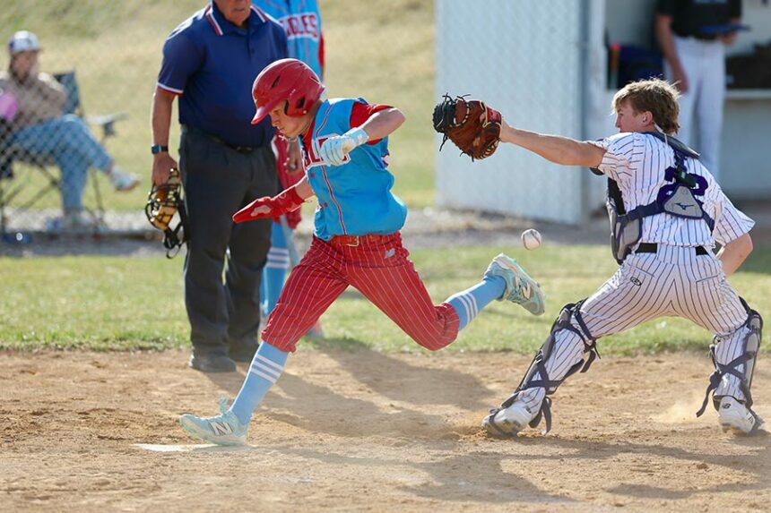 Marsh Valley Hunter Solomon scores against Snake River Trayton David