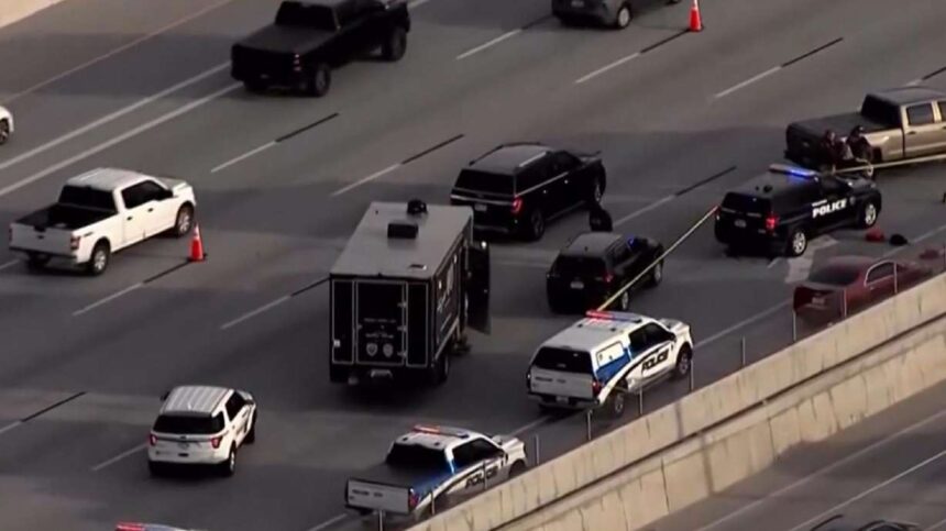 The scene of a police shooting on I-15 in Draper on Tuesday. A man shot during a confrontation with officers has died, police said Wednesday. | Greg Anderson, KSL