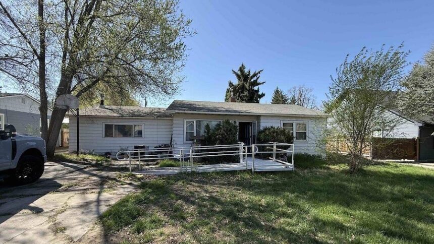 A “before” photo shows a Boise home that won HomeVestors of America’s Ugliest House of the Year contest in 2025.