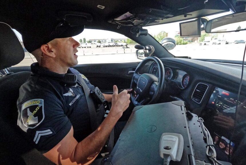 Idaho State Police Corporal Jeff McConnell drives Interstate 84 on patrol between Boise and Caldwell.