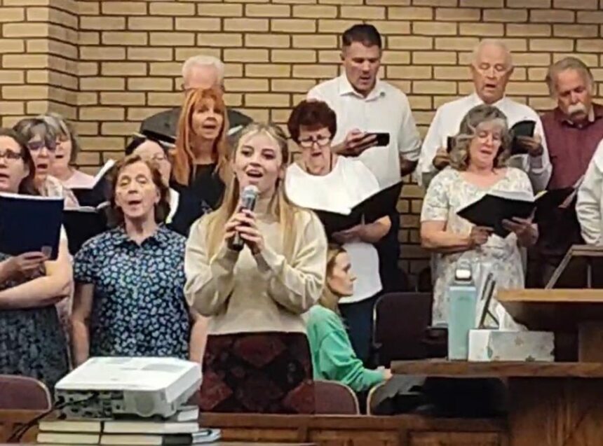 Choir members rehearse for an interfaith Palm Sunday celebration happening this weekend in St. Anthony. Courtesy Sheree Hastings.