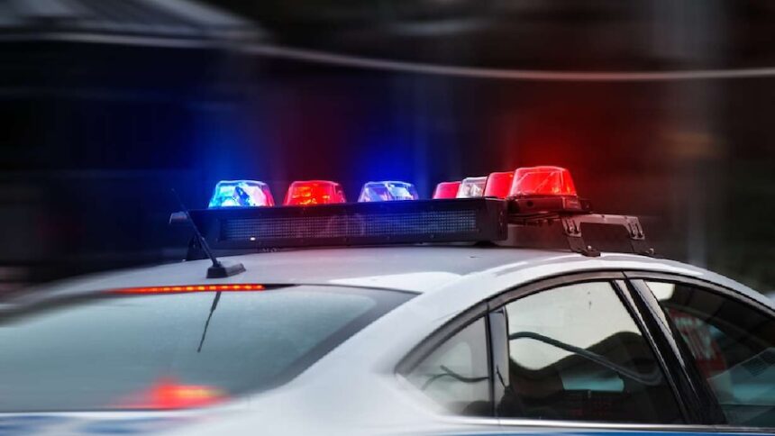 police car with lights on, adobe