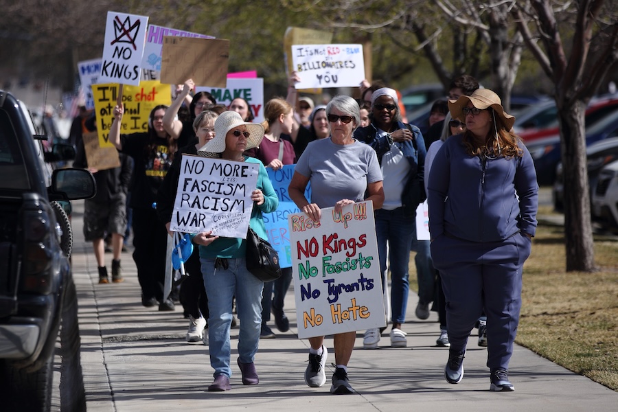 "No Kings" protesters march down the street toward the Bannock County Courthouse in Pocatello on Saturday, March 28, 2026.