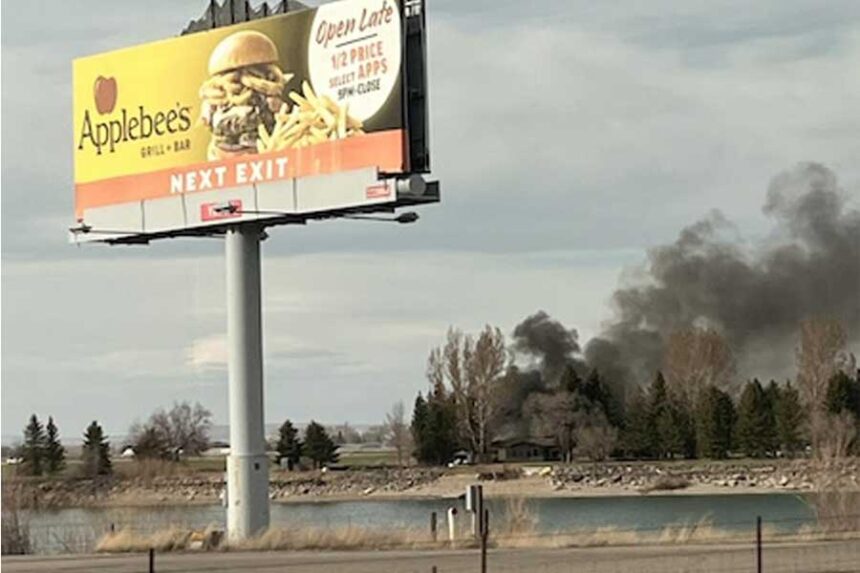 Black smoke rises from a structure fire near Wakeview Lake RV park in Rexburg on Saturday, March 28, 2026.
