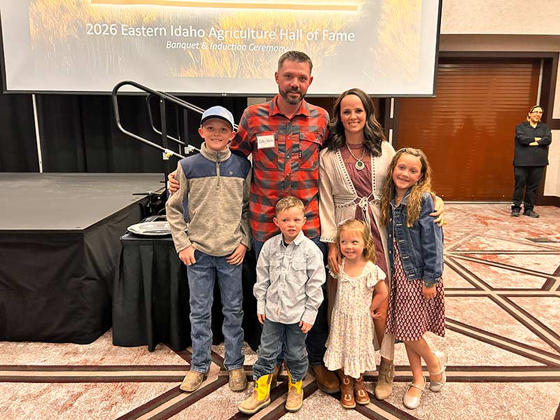 Colby and Shelbi Ward pose for a photo with their kids during Friday night's banquet. | Rett Nelson, EastIdahoNews.com
