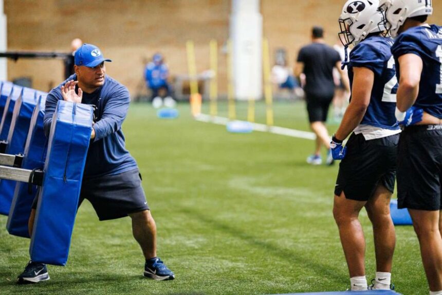 BYU head coach Kalani Sitake shows a drill during practice, Monday, March 2 2026 at the indoor practice facility in Provo, Utah. (Photo: Aaron Cornia, BYU Photo)