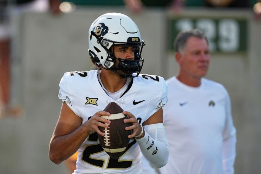 FILE - Colorado quarterback Dominiq Ponder (22) warms up before an NCAA college football game Sept. 14, 2024, in Fort Collins, Colo. (AP Photo/David Zalubowski, File)