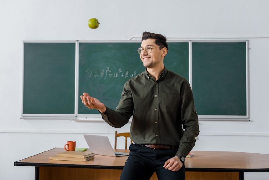 happy male teacher throwing apple in classroom 2026 01 06 00 29 16 utc