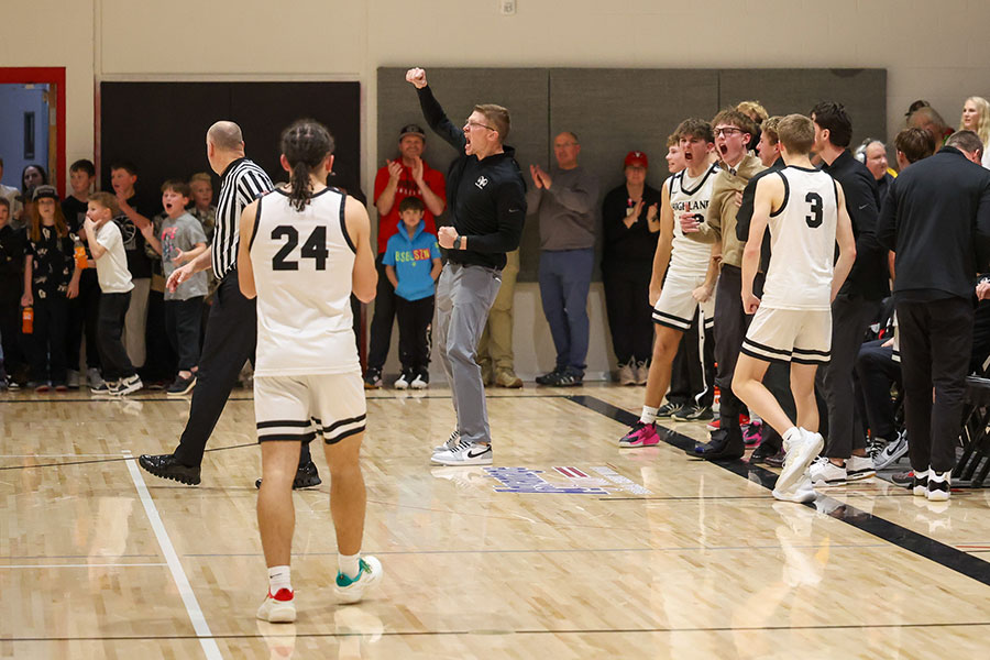 Highland coach Matt Stucki celebrates a big bucket