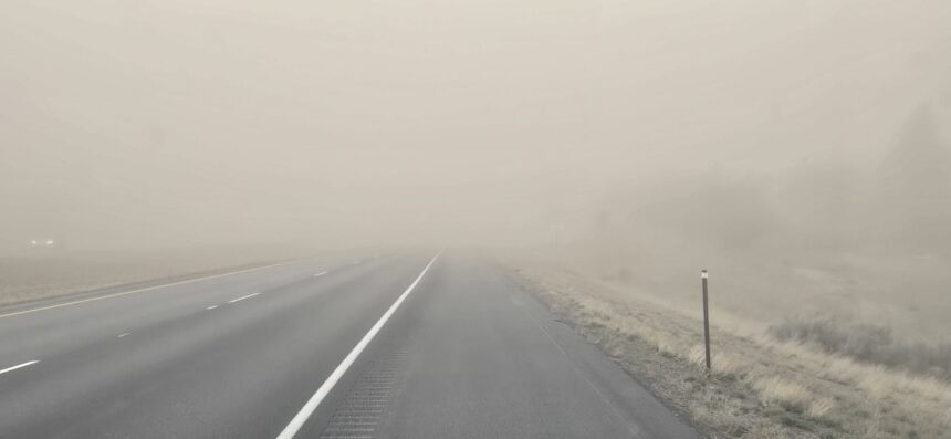 High winds whip up dust along I-15 north of Idaho Falls on Saturday, March 14, 2026, creating very low visibility and forcing the closure of the freeway.